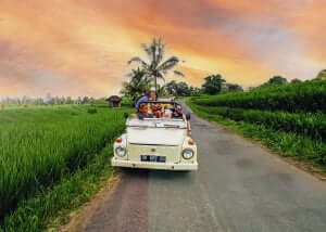 Family enjoying a classic Volkswagen tour adventure at Pertiwi Adventure Bali