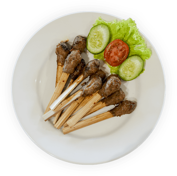 Sate Lilit Ayam - Balinese-style chicken satay, seasoned and grilled.