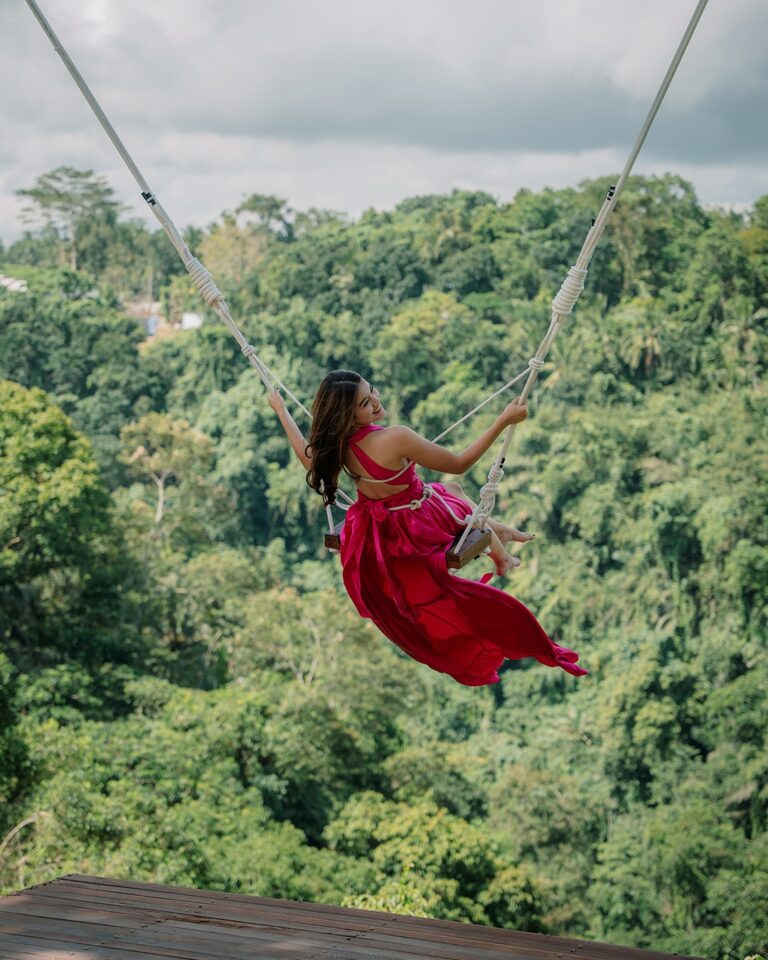 Thrilling swing ride above lush jungle canopy