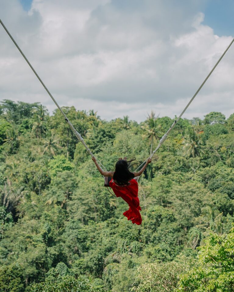 Jungle swing experience at Pertiwi Jungle Swing surrounded by lush tropical jungle